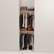 Organized closet featuring a double hanging kit with red cedar shelves, hanging rods, and J-hooks.