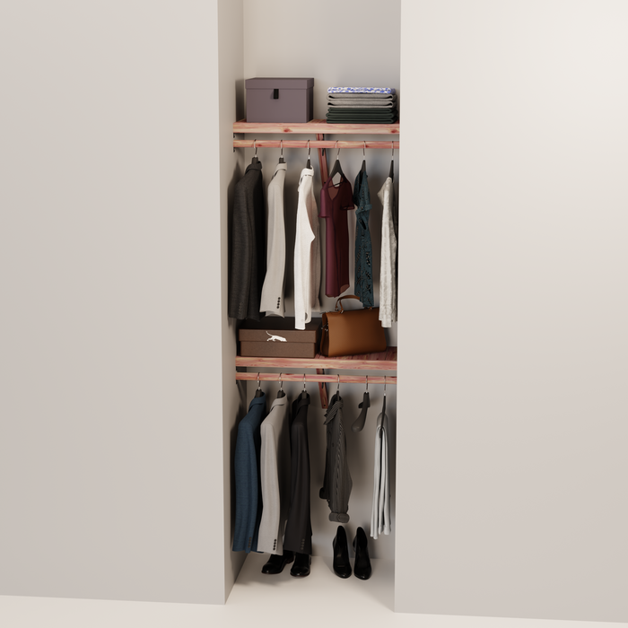 Organized closet featuring a double hanging kit with red cedar shelves, hanging rods, and J-hooks.