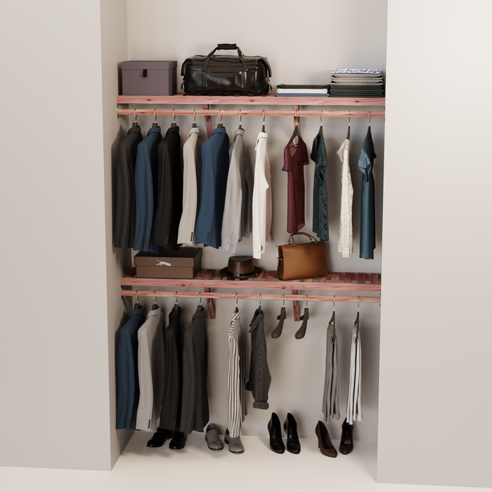 Organized closet featuring a double hanging kit with red cedar shelves, hanging rods, and J-hooks.